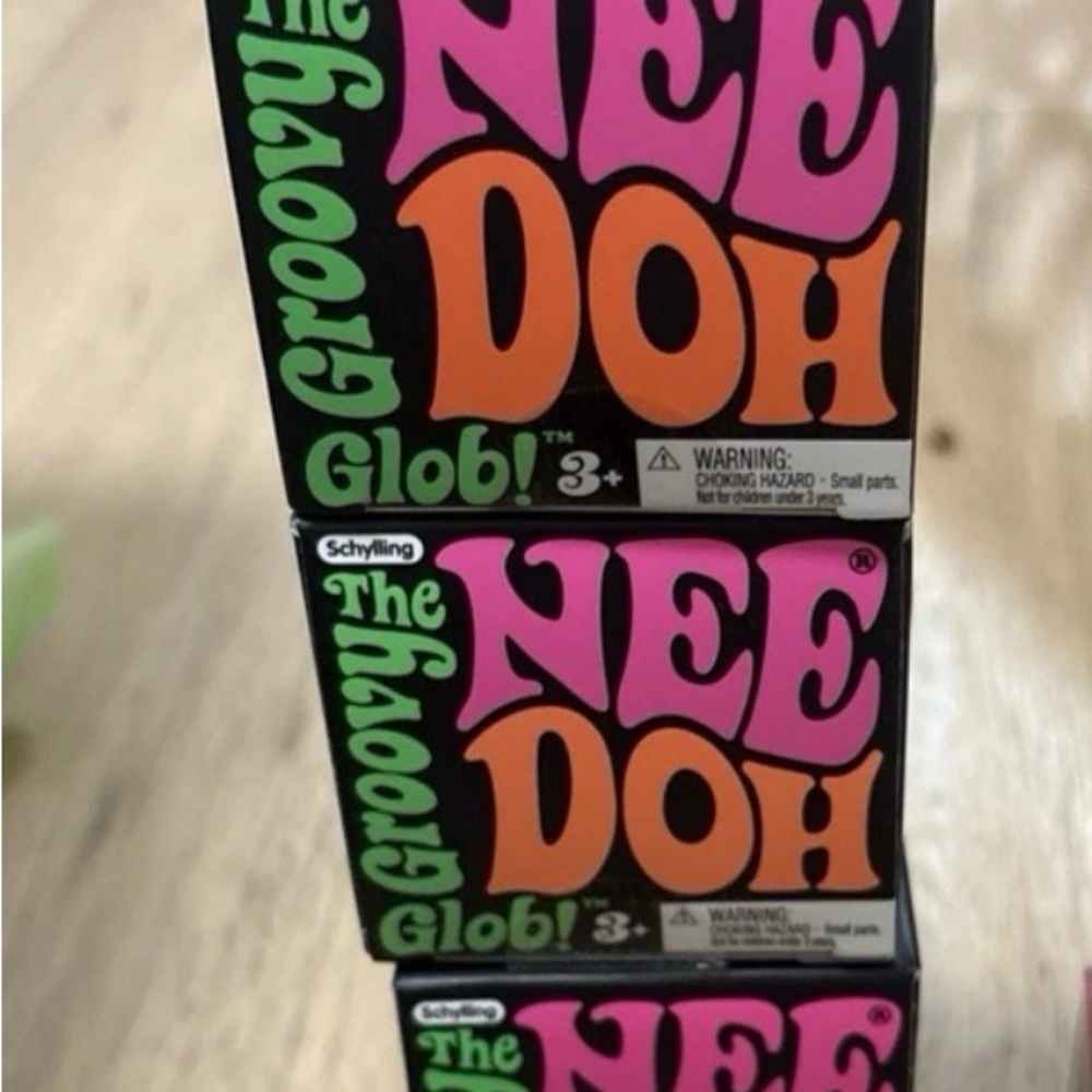 The Nee Doh Groovy glob X 2Stress Ball Toy - purple and teal New in box